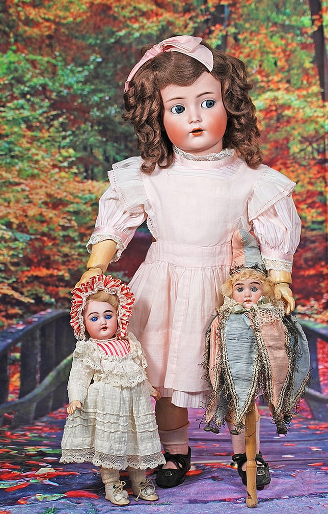 GERMAN BISQUE MAROTTE. 14”. Marks: 6/0 (head); Made in France (paper label on cylinder).: GERMAN BISQUE MAROTTE. 14”. Marks: 6/0 (head); Made in France (paper label on cylinder). Bisque head with stationary blue glass eyes, painted lashes, feathered brows, open mouth, upper teeth, af