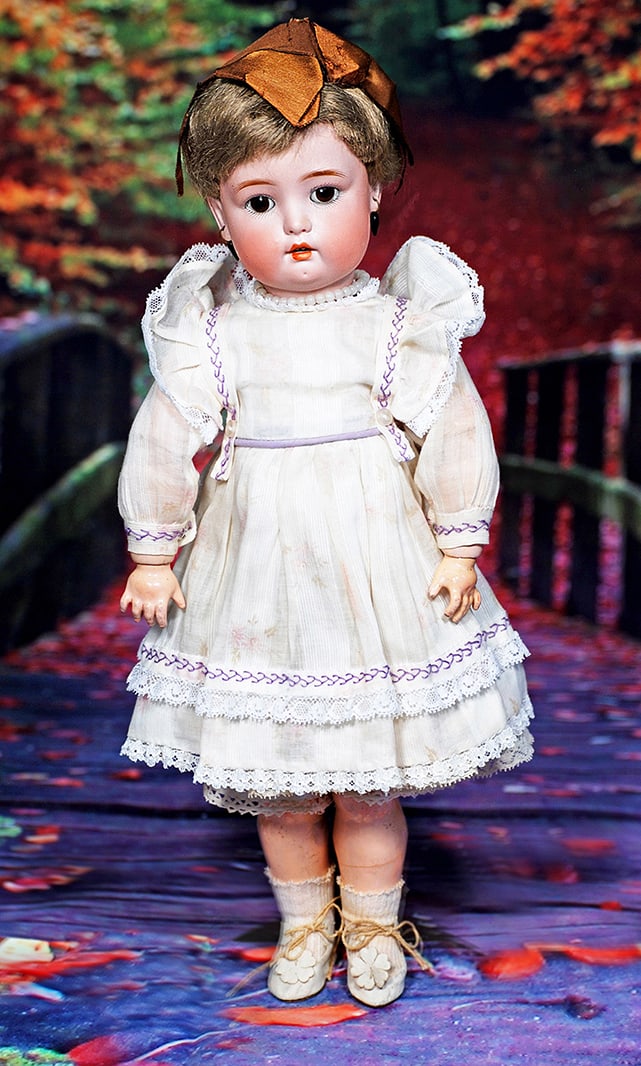 PETITE SIMON AND HALBIG, 1299, CHILD DOLL. 14”. Marks: 1299 Simon & Halbig S & H. Bisque: PETITE SIMON AND HALBIG, 1299, CHILD DOLL. 14”. Marks: 1299 Simon & Halbig S & H. Bisque socket head, brown sleep eyes, painted lashes, feathered brows, open mouth, accented lips, two upper teet