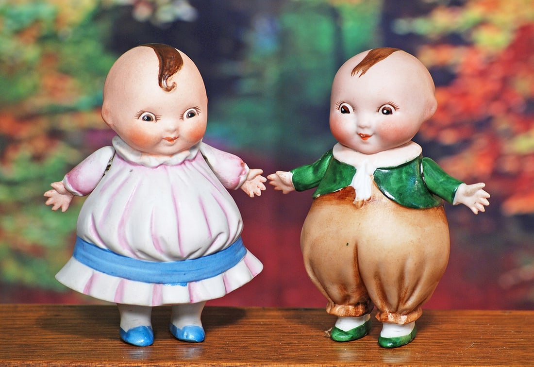 GERMAN ALL-BISQUE MR. AND MRS. HAPPI-FATS. 5”. Marks: c. Designed by Charles Twelvetrees: GERMAN ALL-BISQUE MR. AND MRS. HAPPI-FATS. 5”. Marks: c. Designed by Charles Twelvetrees and made in Germany circa 1920. Each is one-piece bisque head, torso and short stubby legs, painted forel