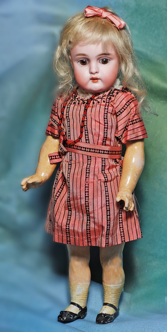 GERMAN BISQUE CHILD WITH SQUARE-CUT TEETH BY KESTNER. 11”. Marks: made in Germany 155.: GERMAN BISQUE CHILD WITH SQUARE-CUT TEETH BY KESTNER. 11”. Marks: made in Germany 155. Bisque socket head, brown sleep eyes, painted lashes, feathered brows, open mouth, accented lips, upper squ