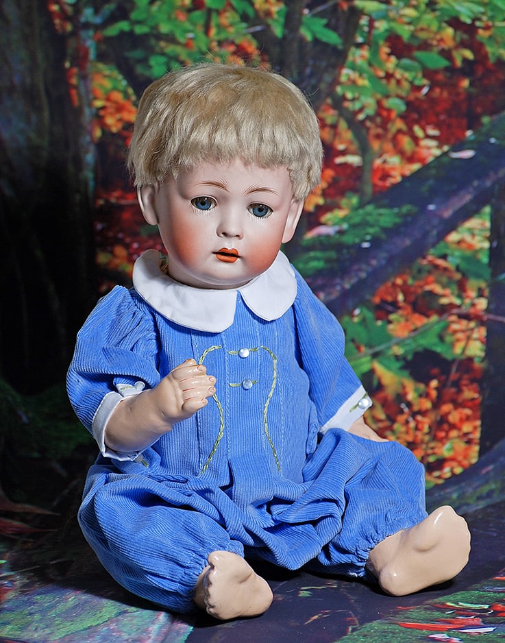 GERMAN BISQUE CHARACTER BABY BY KONIG AND WERNICKE. 17”. Marks: K W made in 10 Germany.: GERMAN BISQUE CHARACTER BABY BY KONIG AND WERNICKE. 17”. Marks: K W made in 10 Germany. Bisque socket head, blue sleep eyes, painted lower lashes, applied upper lashes, feathered brows, open mou