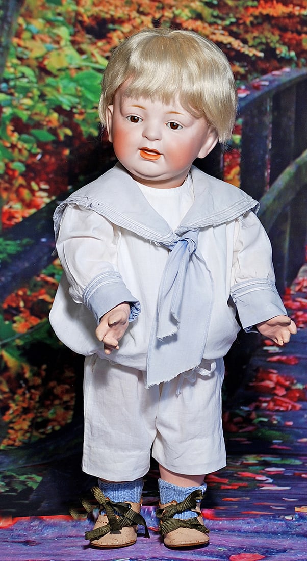 GERMAN BISQUE J.D.K. CHARACTER WITH TODDLER BODY.  15 ½”.  Marks: H. made in Germany 12, (1 of 2)