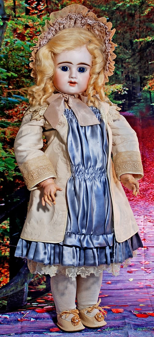 LARGE, SIZE 11, FRENCH BISQUE BEBE BY ETIENNE DENAMUR. 27”. Marks: E. 11 D. Depose. Bisque: LARGE, SIZE 11, FRENCH BISQUE BEBE BY ETIENNE DENAMUR. 27”. Marks: E. 11 D. Depose. Bisque socket head, blue glass paperweight eyes, long painted lashes, feathered brows, open mouth with full li