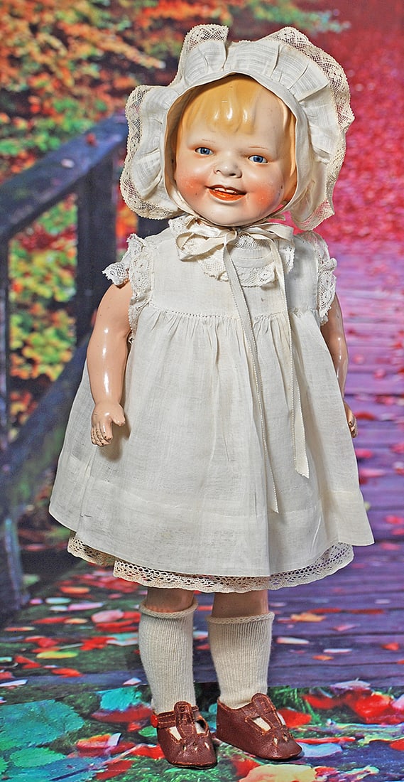 GERMAN EARTHENWARE CHARACTER DOLL “GLADDIE”. 17”. Marks: Gladdie copyright by: GERMAN EARTHENWARE CHARACTER DOLL “GLADDIE”. 17”. Marks: Gladdie copyright by Helen Jensen. Earthenware flanged head with sculpted hair, small blue glass sleep eyes, closed mouth mod