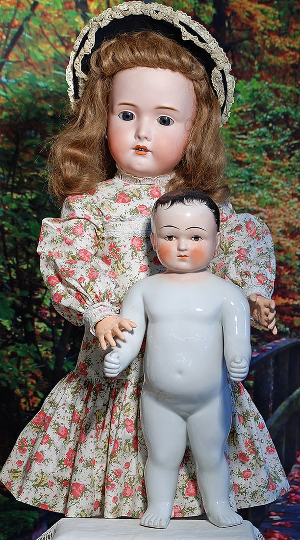 GERMAN BISQUE DOLL MAJESTIC BY EDMUMD URLICH STEINER. 30”. Marks: Majestic. Bisque socket: GERMAN BISQUE DOLL MAJESTIC BY EDMUMD URLICH STEINER. 30”. Marks: Majestic. Bisque socket head, blue sleep eyes, painted lashes, feathered brows, open mouth, accented lips, upper teeth, light br