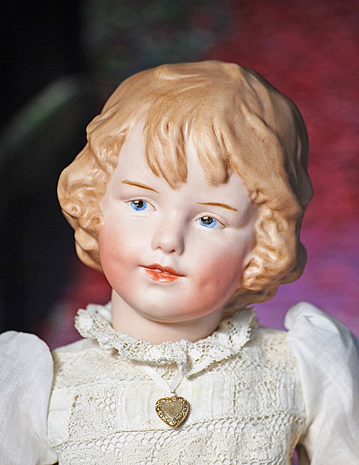 ARTIST GEBRUDER HEUBACH BISQUE CHARACTER CHILD MODEL 7696. 14". Marks: 7956 Heubach Germany.: ARTIST GEBRUDER HEUBACH BISQUE CHARACTER CHILD MODEL 7696. 14". Marks: 7956 Heubach Germany. Bisque socket head with tousled brown sculpted hair accented with forelock curls and shaded coloring, intag