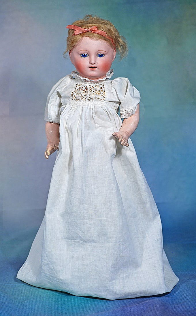 FRENCH BISQUE BEBE GIGOTEUR BY JULES STEINER. 16”. Marks: None. Solid domed bisque head: FRENCH BISQUE BEBE GIGOTEUR BY JULES STEINER. 16”. Marks: None. Solid domed bisque head with, blue glass inset eyes, dark eyeliner, painted lashes, rose-blushed eye shadow, brushstroked brows, o