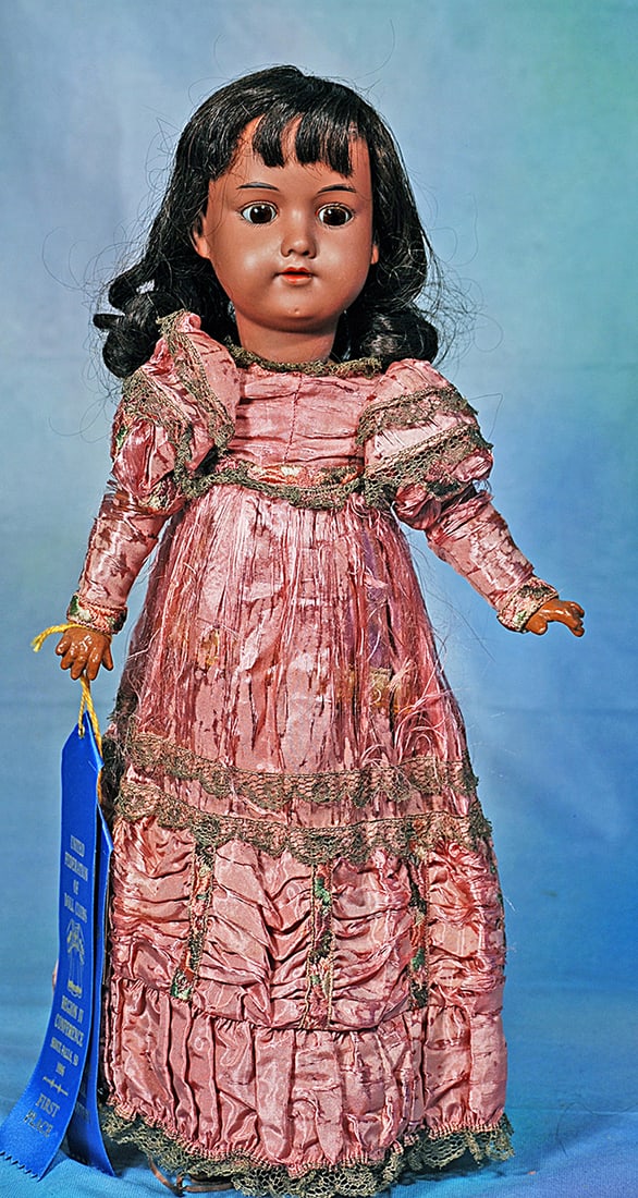 GERMAN BROWN BISQUE CHILD BY MARSEILLE. 18”. Marks: A 390 M. Brown bisque socket head,: GERMAN BROWN BISQUE CHILD BY MARSEILLE. 18”. Marks: A 390 M. Brown bisque socket head, brown sleep eyes, painted lashes, feathered black brows, open mouth, upper teeth, brown composition and woo