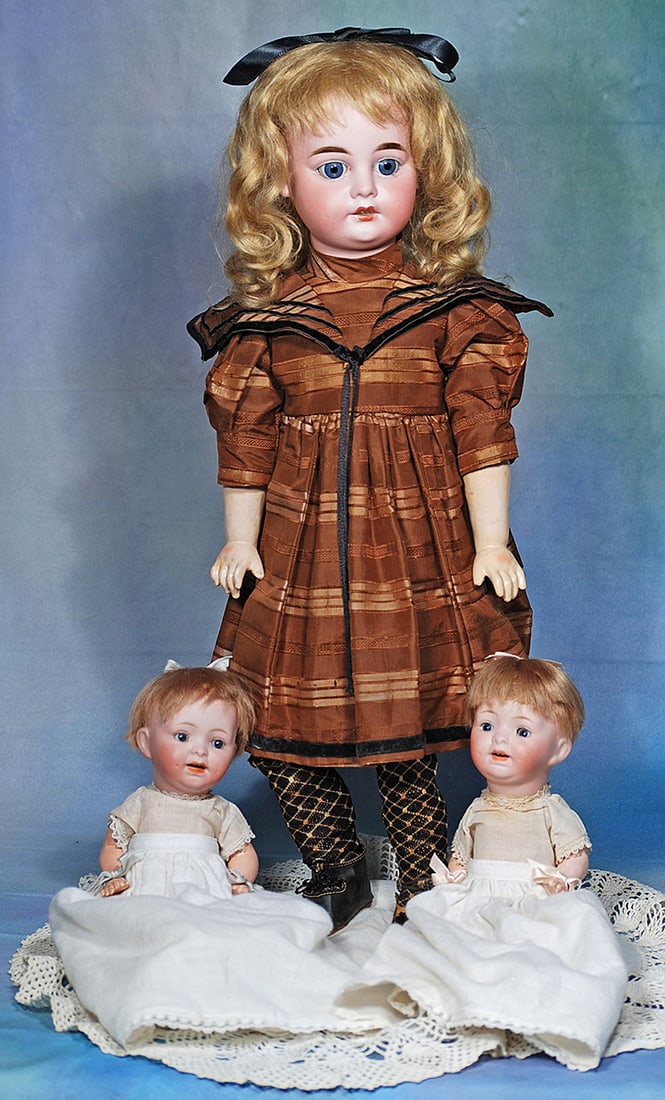THREE DOLLS: GERMAN BISQUE DOLL, 1894, BY MARSEILLE AND TINY TWIN CHARACTER BABIES. 10” twin: THREE DOLLS: GERMAN BISQUE DOLL, 1894, BY MARSEILLE AND TINY TWIN CHARACTER BABIES. 10” twin babies by Morimura Bros., socket heads with stationary blue glass eyes, open mouth, original wig, com