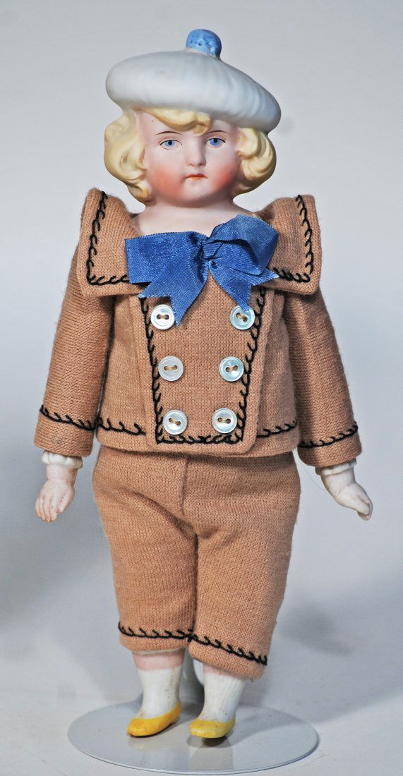 GERMAN BISQUE DOLL WITH SCULPTED BONNET. (1 of 1)