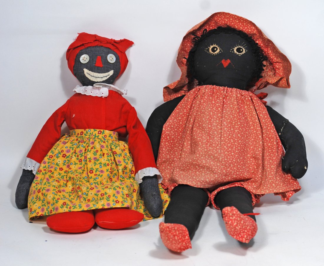 TWO BLACK CLOTH FOLK DOLLS: 44. TWO BLACK CLOTH FOLK DOLLS. 15” doll with applied button eyes, cloth stitched mouth and nose, mammy type costume; 20” folk doll with stitch-jointed body, embroidered eyes and mouth, cu