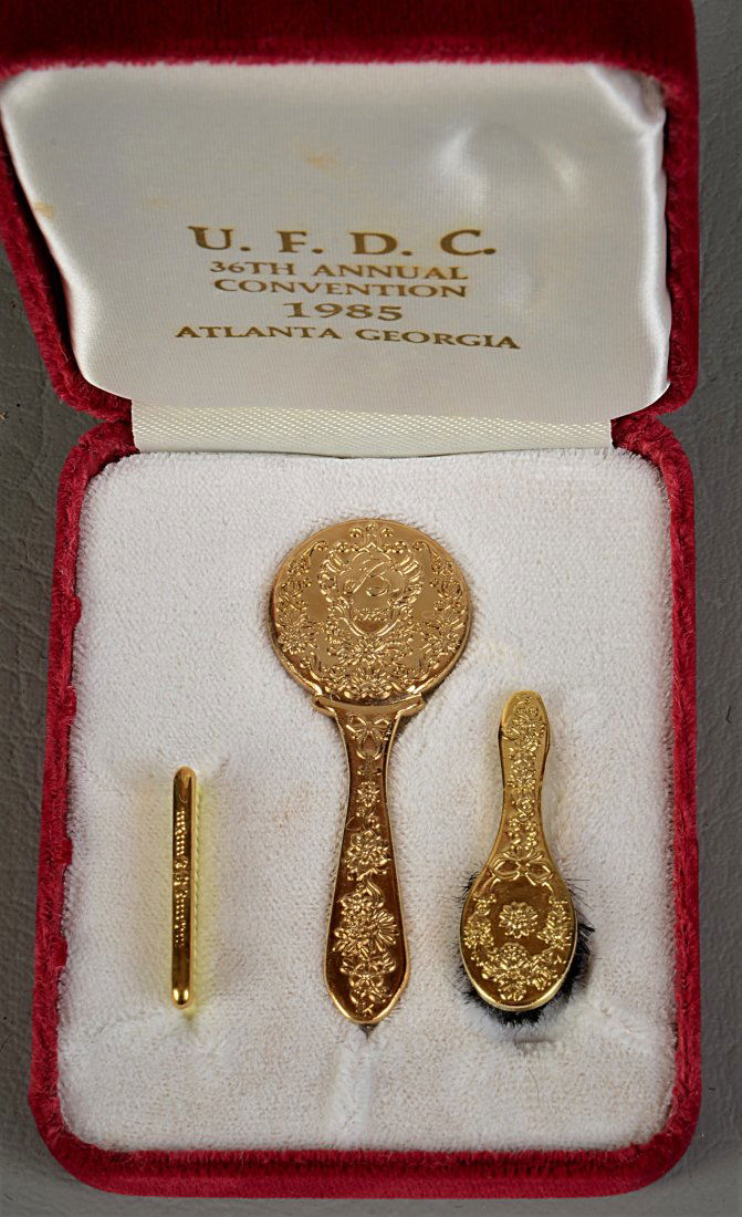 EMBOSSED GOLD OVER COPPER MINIATURE DRESSER SET. (1 of 2)