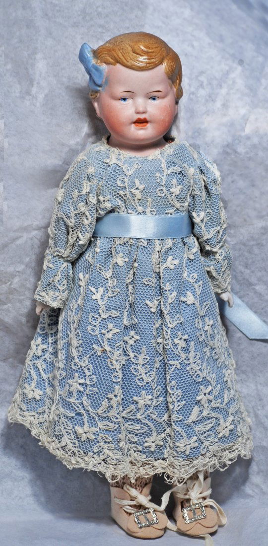 GERMAN BISQUE CHARACTER DOLL ATTRIBUTED TO HERTWIG. (1 of 2)