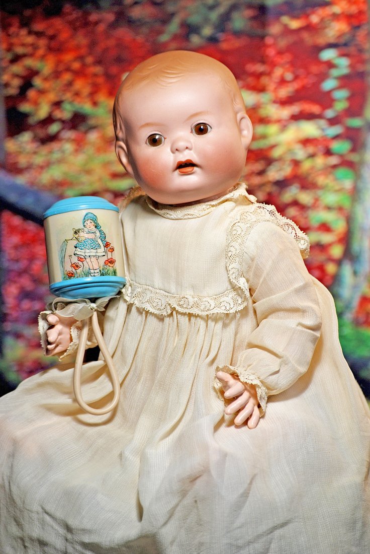 RARE GERMAN BISQUE CHARACTER, 125, BY MARSEILLE.: 106. RARE GERMAN BISQUE CHARACTER, 125, BY MARSEILLE. 14”. Marks: 125 ½ Germany. Solid domed bisque head with flat-cut neck socket that accommodates to composition neck dowel of torso, pa