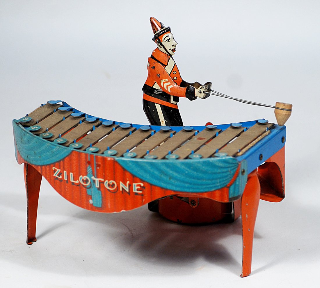 WOLVERINE ZILOTONE, MUSICAL TIN LITHOGRPAHED TOY (1 of 2)