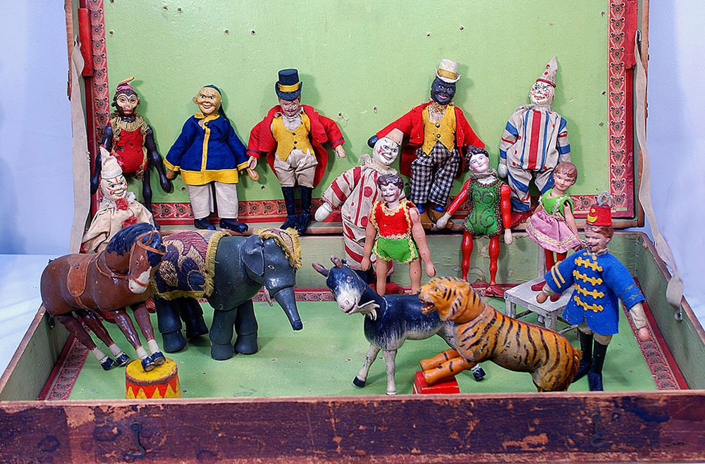 SCHOENHUT WOODEN CIRCUS FIGURES AND ANINMALS WITH CIRCUS BOX Each is carved wooden figure with: Each is carved wooden figure with painted finish Ten people, including Ringmaster, Chinaman, Lion Tamer, Black