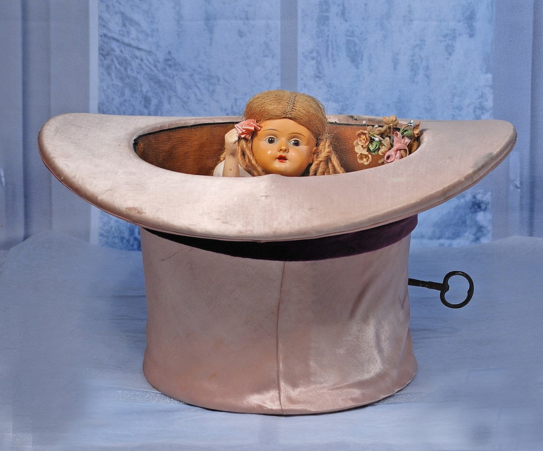 CELLULOID MUSICAL MECHANICAL DOLL IN HAT (1 of 1)