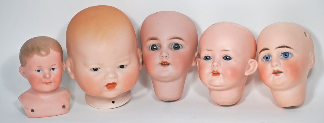 FIVE GERMAN BISQUE DOLL HEADS. (1 of 1)
