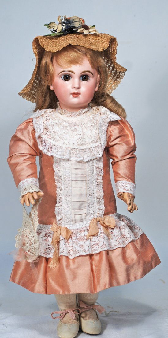 FRENCH BISQUE BEBE BY JUMEAU.: 50. FRENCH BISQUE BEBE BY JUMEAU. 19”. Marks: Depose Tete Jumeau, bte SGDG 8. Bisque socket head, brown paperweight eyes, painted lashes, eyeliner, rose-blushed eyelids, feathered and brushstrok