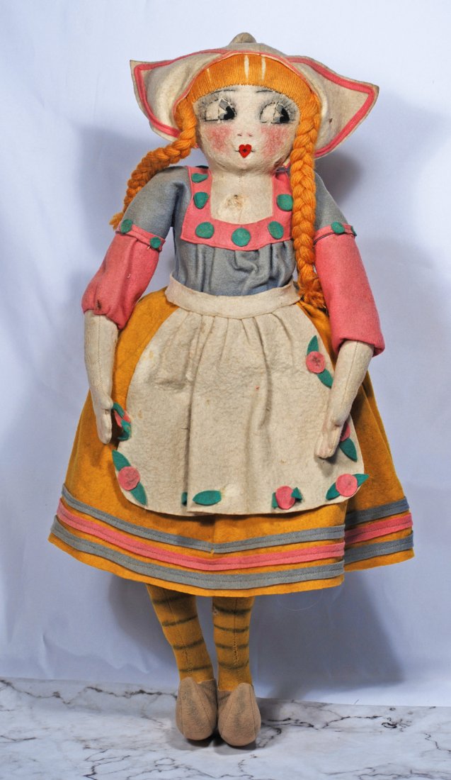 LARGE ANTIQUE FELT DOLL WITH GOOGLY EYES. (1 of 1)