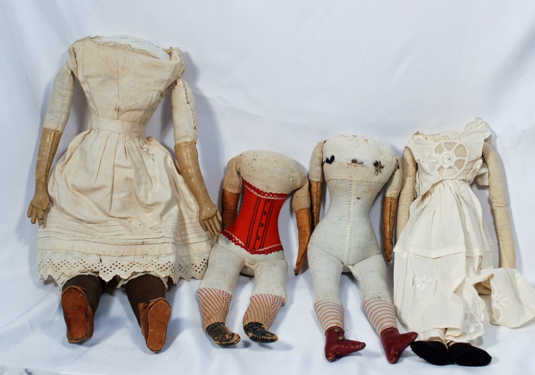 FOUR CLOTH DOLL BODIES. (1 of 1)
