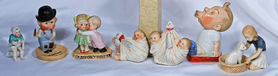 SEVEN BISQUE AND PORCELAIN NOVELTY ITEMS AND FIGURES (1 of 1)