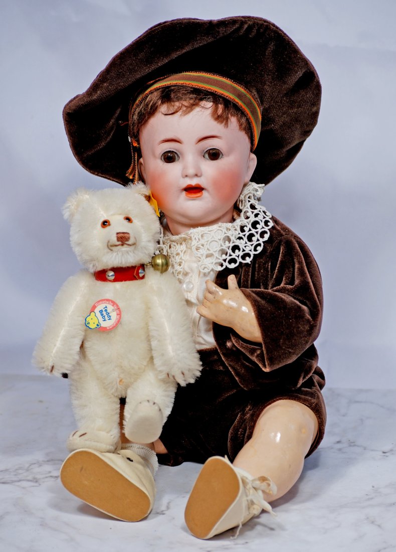 ALT, BECK & GOTTSCHLAK BISQUE CHARACTER BABY AND STEIFF TEDDY BABY.: 94. ALT, BECK & GOTTSCHLAK BISQUE CHARACTER BABY AND STEIFF TEDDY BABY. 14”. Marks: ABG 1362. Bisque socket head, brown sleep eyes, painted and applied lashes, feathered brows, open mouth, two u