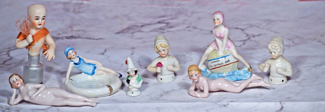 GROUP OF GERMAN PORCELAIN HALF DOLLS AND BATHING BEAUTIES. (1 of 1)
