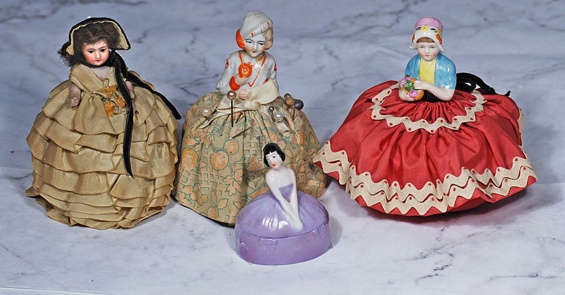 FOUR HALF DOLLS. (1 of 1)