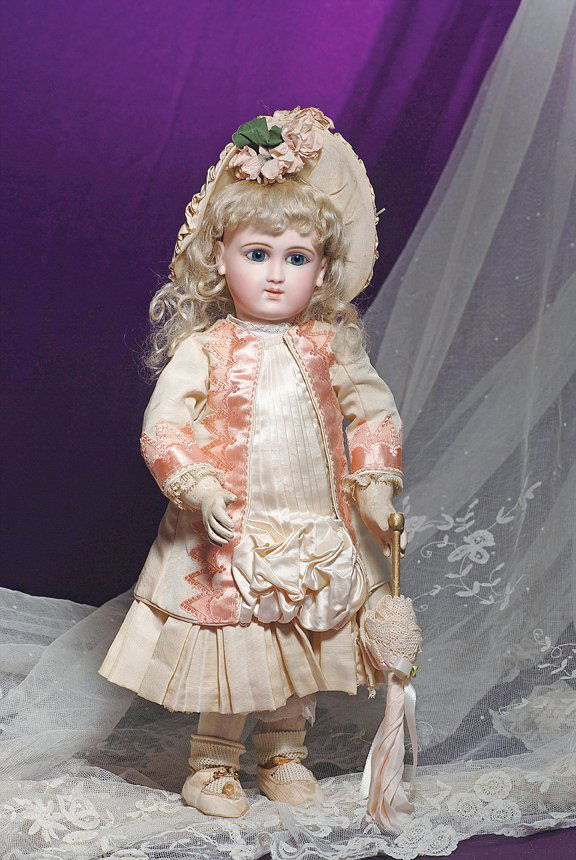 SUPERB EARLY FRENCH BISQUE BEBE BY SCHMITT ET FILS: SUPERB EARLY FRENCH BISQUE BEBE BY SCHMITT ET FILS. Marks: 8 Sch (in shield on head); body stamped with Schmitt mark. 18”. Bisque socket head with elongated facial modeling, blue paperweight eyes, d