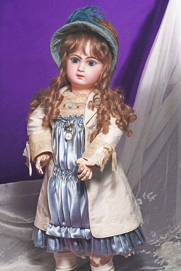 LOVELY BLUE-EYED FRENCH BISQUE BEBE BY JUMEAU: LOVELY BLUE-EYED FRENCH BISQUE BEBE BY JUMEAU. Marks: Depose Tete Jumeau 12”. 26” Bisque socket head, blue paperweight eyes, painted lashes, eyeliner, feathered and brushstroked brows, pierced ear