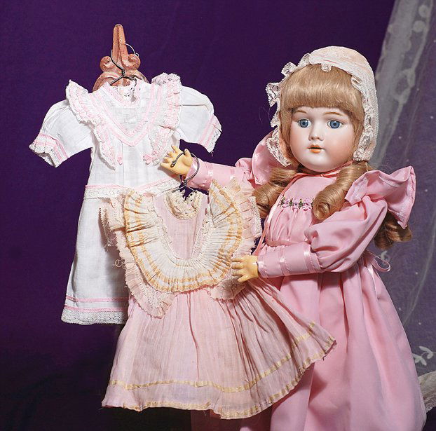 GERMAN BISQUE DOLL BY HANDWERCK: GERMAN BISQUE DOLL BY HANDWERCK. Marks: 99 Dep Handwerck 3. 21”. Bisque socket head, blue sleep eyes, painted lashes, feathered brows, open mouth, shaded and accented lips, blonde human hair wig, co