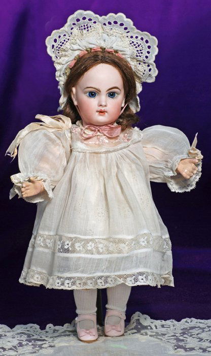 PRECIOUS SIZE 3 “E. J.” BISQUE BEBE BY JUMEAU.: PRECIOUS SIZE 3 “E. J.” BISQUE BEBE BY JUMEAU. Marks: Depose E 3 J. 11 ½”. Bisque socket head, blue paperweight eyes, painted lashes, feathered and brushstroked brows, pierced ears, closed mout