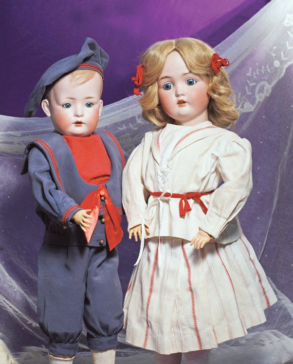 GERMAN BISQUE CHARACTER KNOWN AS “TOMMY TUCKER” BY: GERMAN BISQUE CHARACTER KNOWN AS “TOMMY TUCKER” BY BRUNO SCHMIDT. Marks: BSW 2048 - 5 ½. 24”. Solid-dome bisque socket head, molded and painted light brown side-parted hair, blue sleep eyes, pa