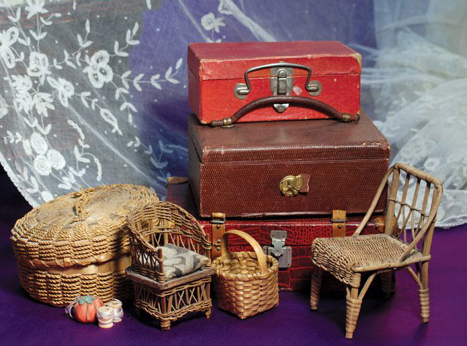 SMALL DOLL TRUNKS, CHAIRS & BASKETS: SMALL DOLL TRUNKS, CHAIRS & BASKETS. Includes: 10 ½” L. x 3 ¼” H. firm cardboard trunk covered in deep red simulated alligator paper with applied tan leather corner detail and leather straps, me
