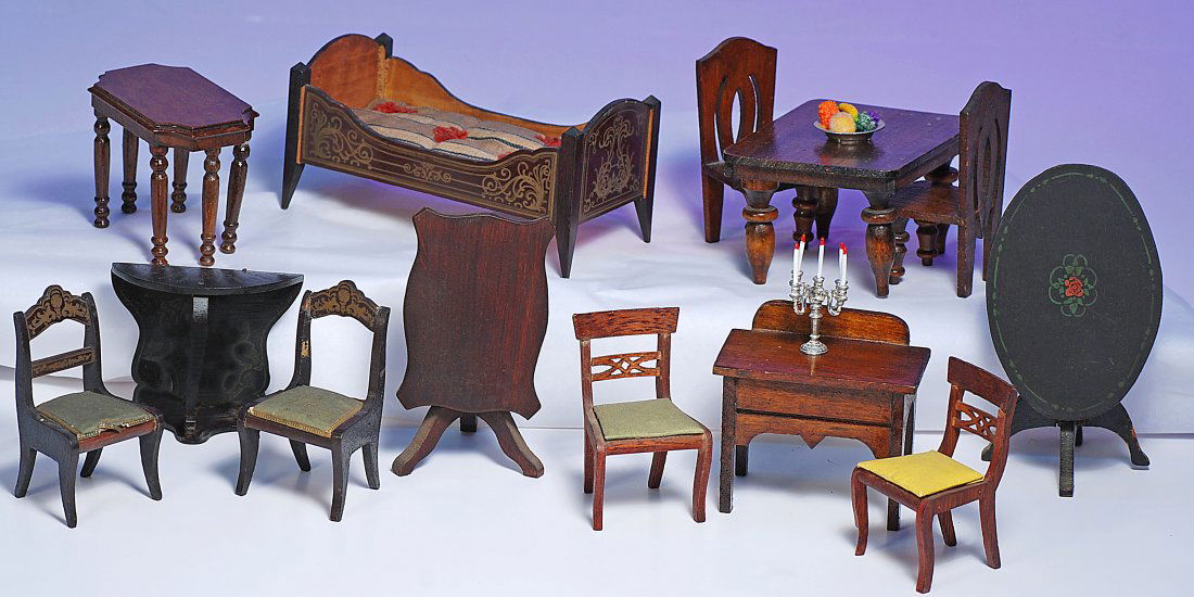 LARGE DOLLHOUSE FURNISHINGS ASSORTMENT: DOLL HOUSE FURNISHING GROUP. Includes: Dark wooden Beidermeier bed with stenciled headboard and footboard, original mattress; four chairs with upholstered seats; Strombecker walnut library table; waln
