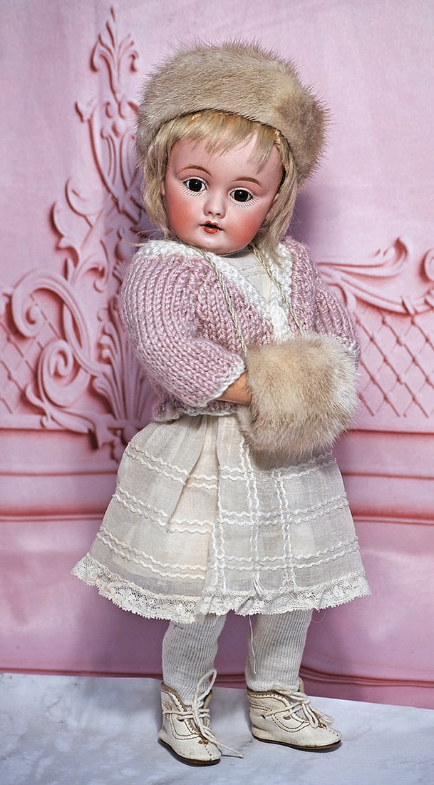 GERMAN BISQUE CHILD, 143, BY KESTNER: 13” Marks: B made in Germany 6, 143 Bisque socket head, brown sleep eyes, painted lashes, feathered brows, open mouth, accented lips, two upper teeth, original blonde mohair wig over plaster pate, c