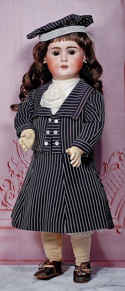 GERMAN BISQUE CHILD, 224, BY BAHR AND PROSCHILD: 25” Marks: 224 Bisque socket head, brown sleep eyes, painted lashes, eye liner, feathered and brushstroked brows, open mouth, outlined lips, four upper teeth, deep impressed cheek dimples, pierced e