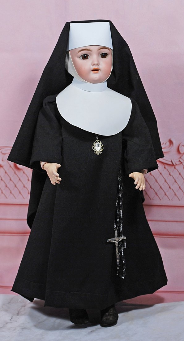 GERMAN BISQUE DOLL IN NUN COSTUME, BY HANDWERCK: 17” Marks: 109 Bisque socket head, brown sleep eyes, painted lashes, feathered brows, open mouth, accented lips, upper teeth, pierced ears, composition and wooden ball-jointed body, black nun ha