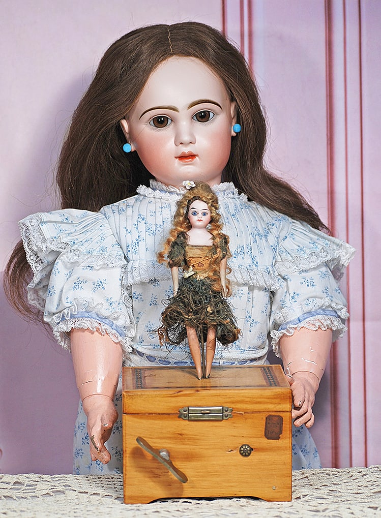 FRENCH BISQUE DANCING DOLL ATOP MUSIC BOX WITH AU LOUVE SHOP LABEL  Marks: Original French paper (1 of 2)