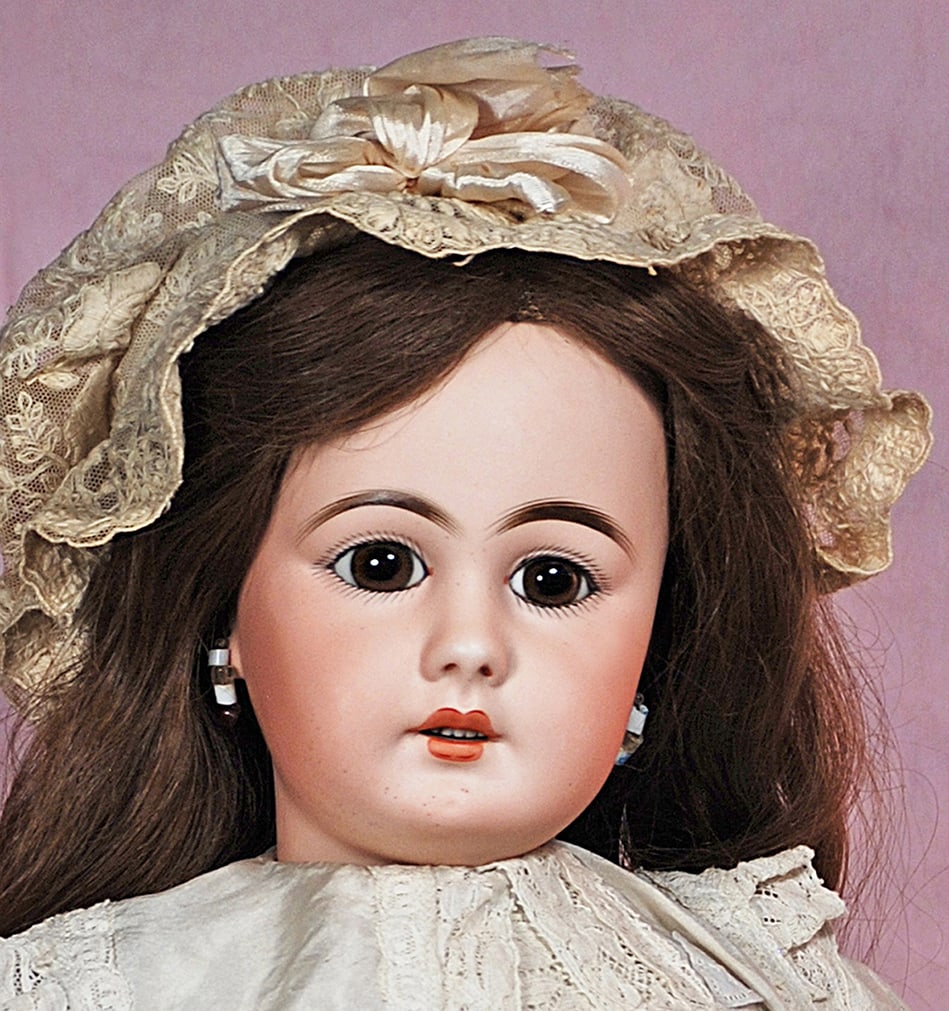 GERMAN BISQUE CHILD, 939, BY SIMON AND HALBIG: 24” Marks: S 14 H Bisque socket head, long face modeling, stationary brown glass eyes, painted lashes, eyeliner, feathered and brushstroked brows, pierced ears, open mouth, accented lips, upper teet