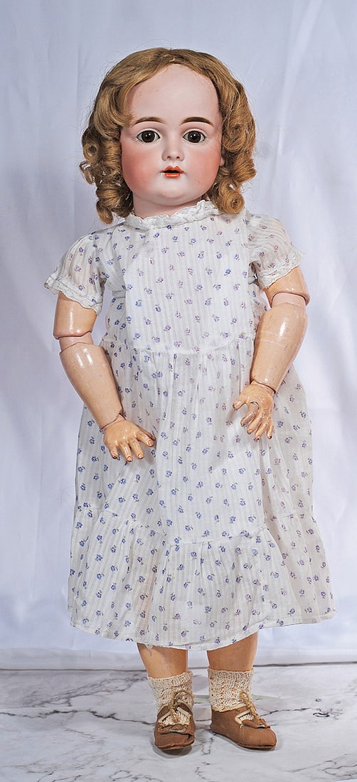 GERMAN BISQUE CHILD, 129, BY KESTNER: 21” Marks: J made in Germany 13 ½, 129 Bisque socket head, brown sleep eyes, painted lashes, feathered brows, open mouth, accented lips, no teeth, light brown human hair wig, plaster pate, original