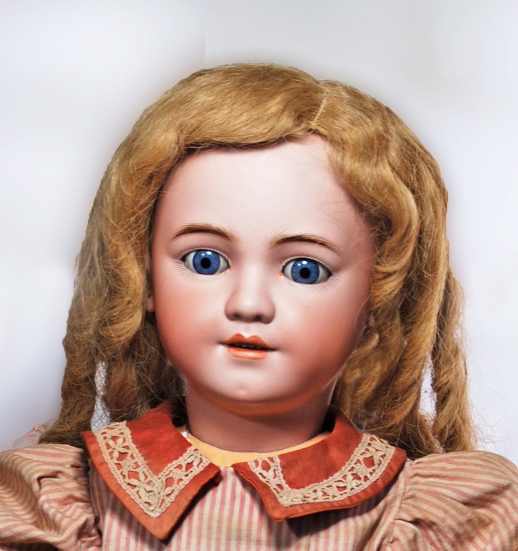 LARGE SIMON AND HALBIG, 1339, BISQUE CHILD: 32” Marks: S H 1339/ 14 Bisque socket head, blue sleep eyes, painted lashes, eyeliner, feathered brows, pierced ears, open mouth, outlined lips, upper teeth, dark blonde human hair wig, Sonneber