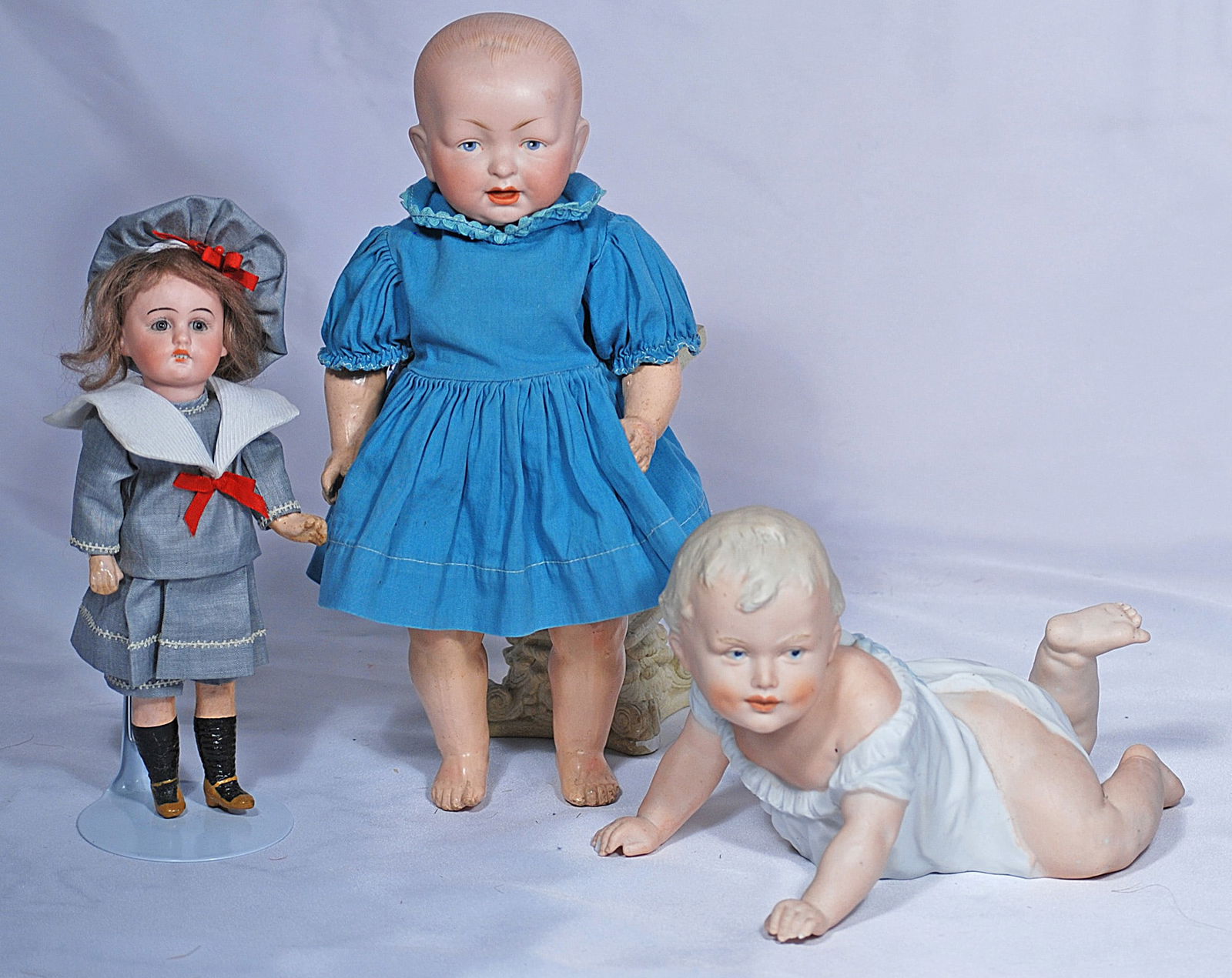 TWO GERMAN BISQUE DOLLS AND HEUBACH PIANO BABY (1 of 1)