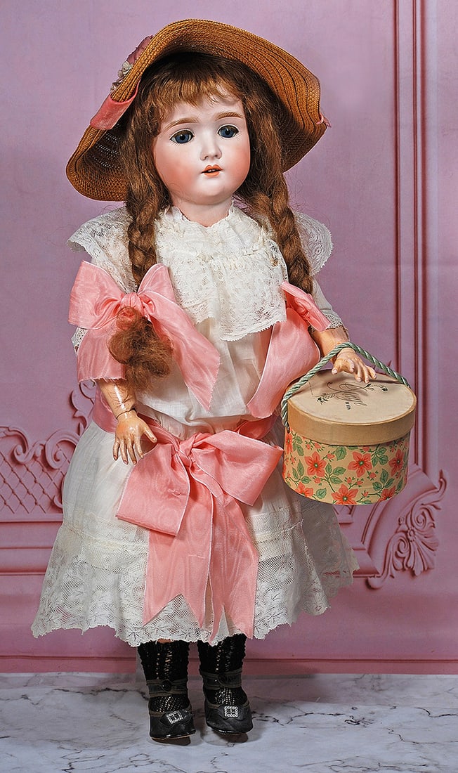 GERMAN BISQUE DOLL “PANSY”: 23” Marks: Pansy III Germany Bisque socket head, blue sleep eyes, painted and applied lashes, feathered brows, open mouth, shaded lips, upper teeth, antique brown human hair wig, composition ball-jo