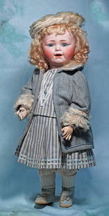 RARE, GERMAN BISQUE SMILING CHARACTER 612 BY BERGMANN WITH TODDLER BODY: RARE, GERMAN BISQUE SMILING CHARACTER 612 BY BERGMANN WITH TODDLER BODY. 19”. Marks: Made in Germany, Simon & Halbig/ C.M. Bergmann 612. Bisque socket head, blue sleep eyes, painted lashes,