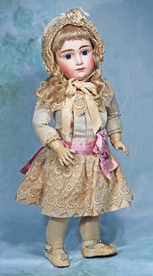 GERMAN BISQUE DOLL KNOWN AS “A.T: GERMAN BISQUE DOLL KNOWN AS “A.T. KESTNER” WITH CLOSED MOUTH. 21”. Marks: 14. Bisque socket head, stationary blue paperweight eyes, dark eyeliner, painted dark curly lashes,
