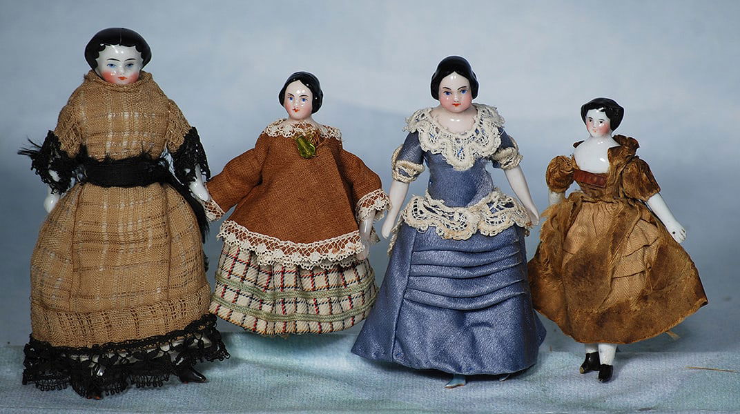 FOUR MINIATURE PORCELAIN DOLL HOUSE DOLLS (1 of 1)