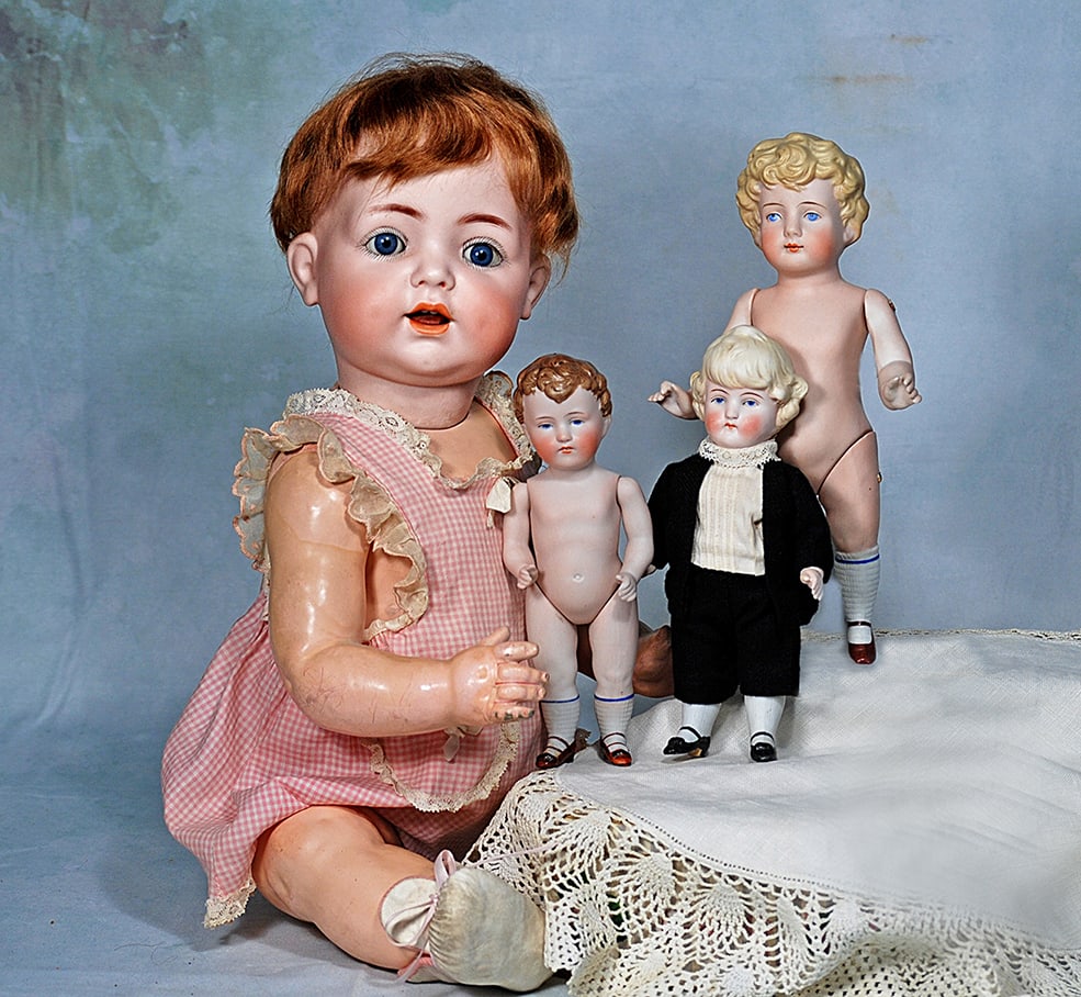 THREE GERMAN ALL-BISQUE DOLLS (1 of 2)
