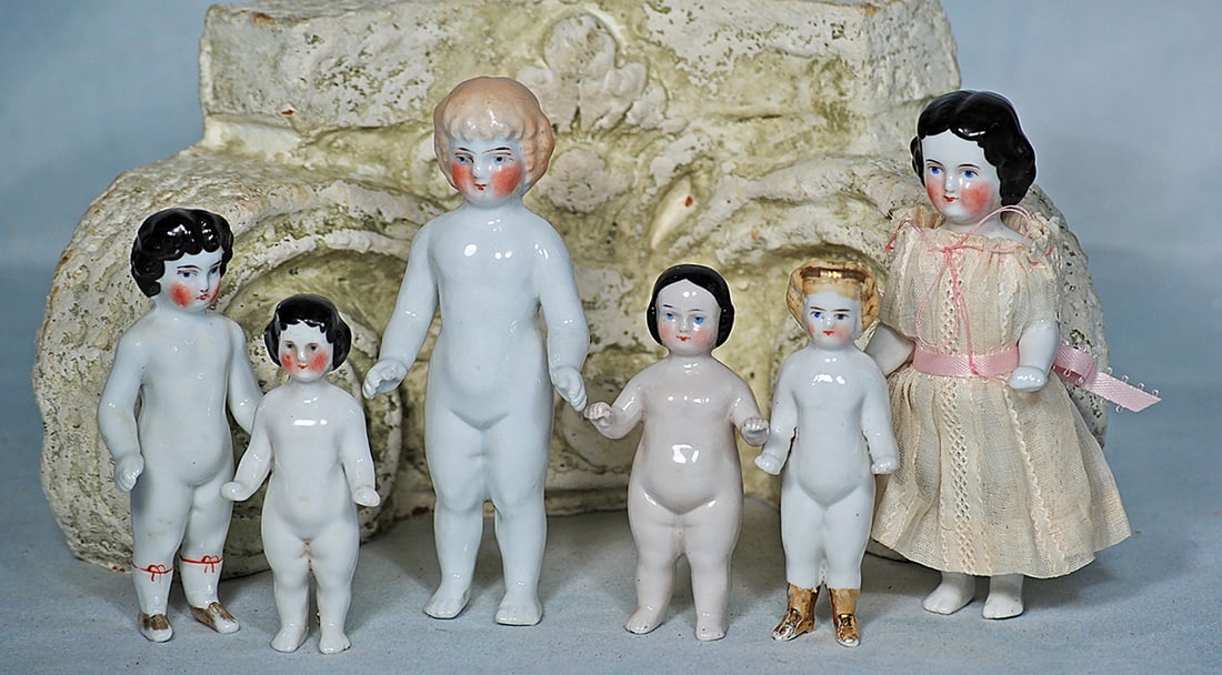 COLLECTION OF SIX GERMAN PORCELAIN FROZEN CHARLOTTE DOLLS (1 of 1)